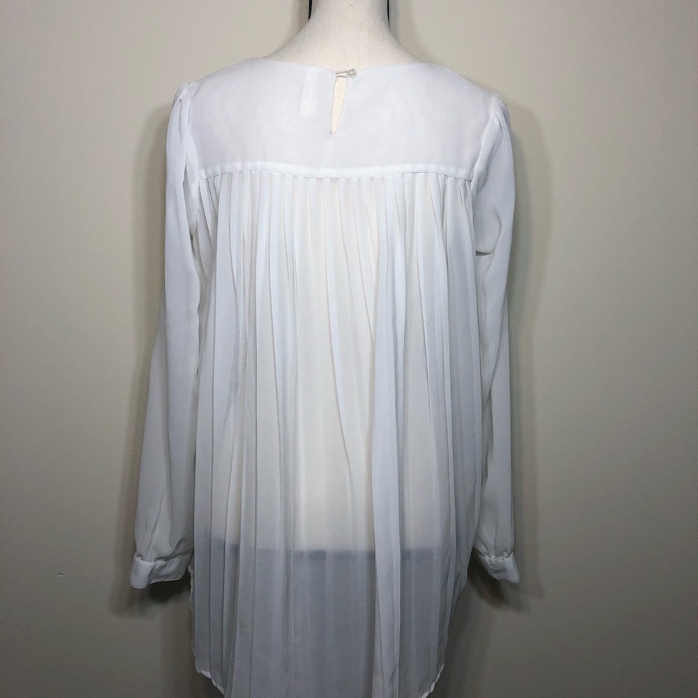 Ethereal white blouse with back pleats